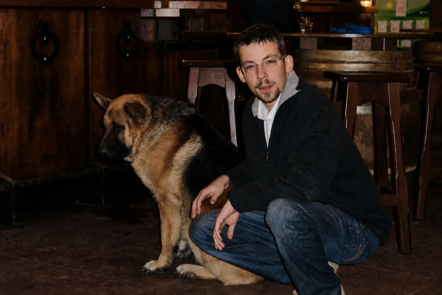 Umberto Giacobbi with a German shepherd in 2010